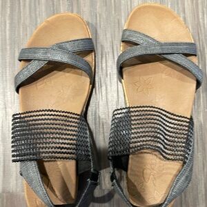 Skechers slip on sandal, in neutral silver color color